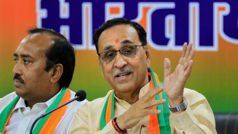 गुजरात के मुख्यमंत्री विजय रूपाणी कोविड पॉजिटिव Yesterday, Chief Minister Vijay Rupani fell on the dais while addressing a rally in Vadodara. He was immediately rushed to a local hospital, where doctors said his condition was stable.