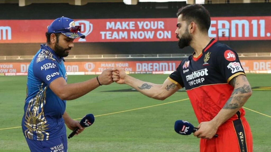 आईपीएल के 14वें सीजन का आगाज, RCB के कप्तान विराट कोहली ने जीता टॉस, लिया बॉलिंग का फैसला The 14th season of the IPL has started. The 5-time champion Mumbai Indians, captained by Rohit Sharma, will once again step down