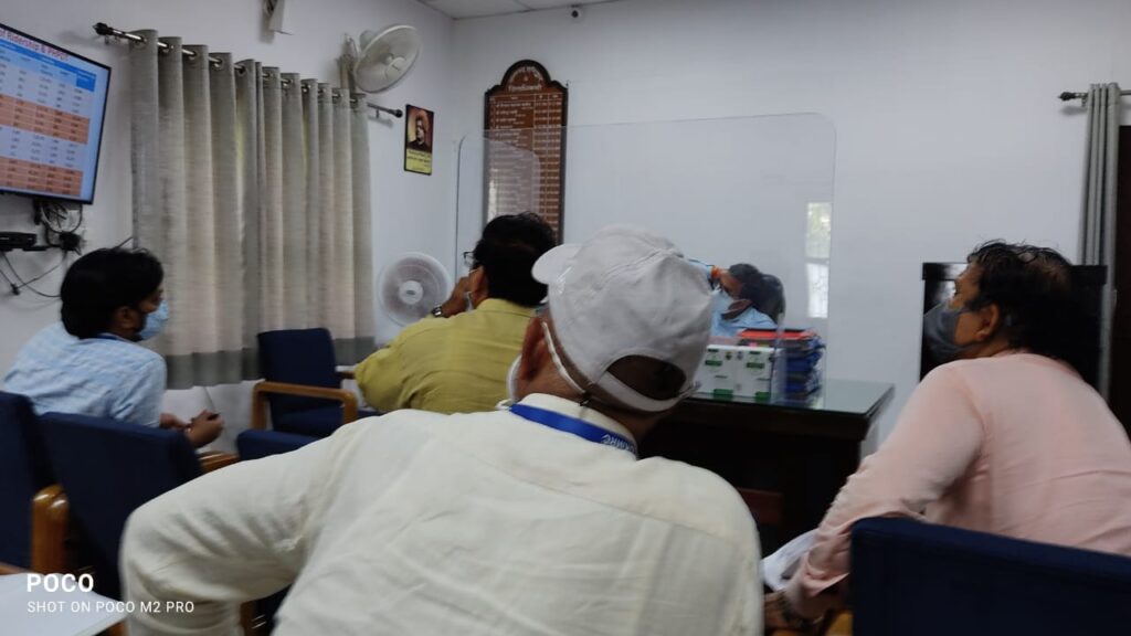 Infrastructure and Building Construction Corporation Ltd. from District Magistrate Shri C. Ravi Shankar on Monday at the camp office.