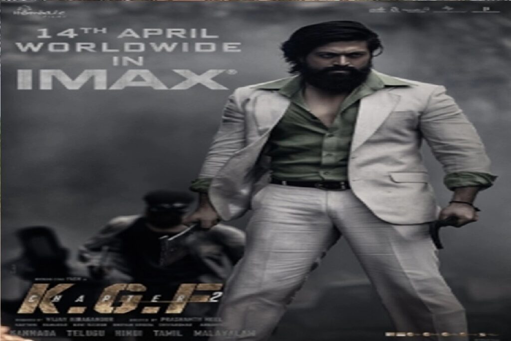 आईमैक्स ने रिलीज किया KGF-2 का नया पोस्टर, दोनों हाथों में हथियार लिए नजर आए एक्टर रॉकी The IMAX exclusive poster shows Rocky with arms in both hands and chaos and goons in the background.